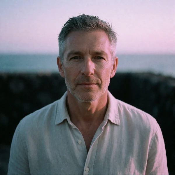 Portrait of an older Western man in his late forties in a light linen shirt, a verified member of the Maldivian Dating community