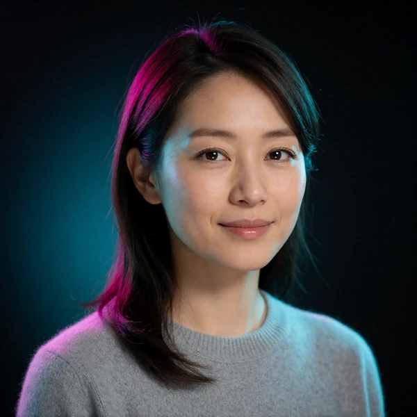 Portrait of a Japanese woman in her early thirties in a grey cashmere sweater, a verified member of the Japanese Dating community