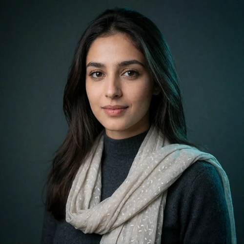 Portrait of a Pakistani woman in a charcoal high-neck top, a verified member of the Pakistani Dating community