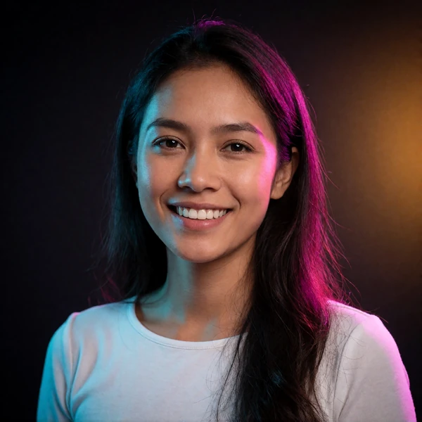 Portrait of a Filipino woman in her early thirties with a warm smile, a verified member of the Filipino Dating community
